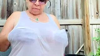 Big tits get wet in tight shirt.