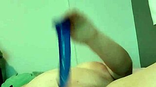 In the night, she indulges in horny playtime, fucking herself with wet dildo and toys.