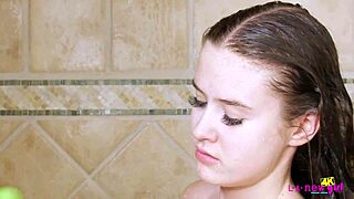Skinny teen 18+ brunette enjoys a relaxing shower bath.