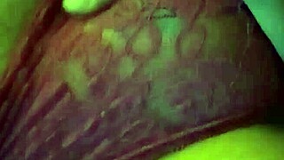 Woman with pierced nipples teases huge tits and wet pussy