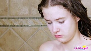 Skinny teen 18+ brunette enjoys a relaxing shower bath.