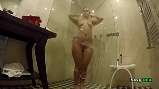 Goddess sexydeas exposed her tan lines in the shower while riding a big cock