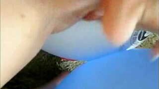 Sophie in Jeans Miniskirt and Red Lingerie Fingers Her Pussy with Two Fingers on Webcam