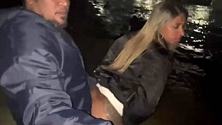 My wife is giving it to another on the beach sand