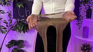 Mature woman in sexy pantyhose roleplays at night club with curvy figure