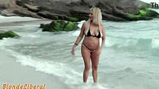 blonde milf blows stranger on beach trailer