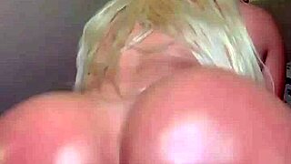 Blonde with huge tits twerking in oil... want to see?