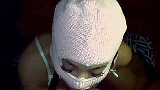 Masked Baddie Deepthroats Big Black Cock
