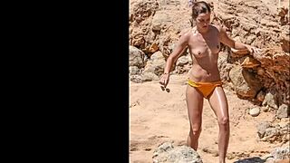 Emma Watson spotted topless on Ibiza beach in June 2022