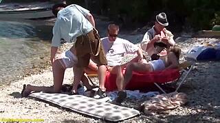 Public beach orgy with rough anal banging and deepthroat group action