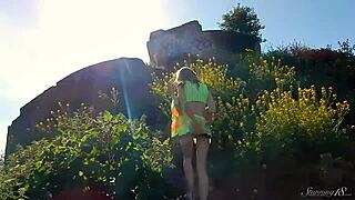 spunky teen 18+ model gets naked while outdoors