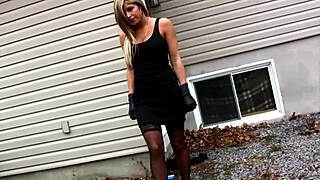 Sexy blonde girlfriend teases with smoking in outdoor lingerie