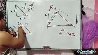 Asian Student Nerd Engages in Bedroom Mathematics Lesson