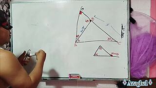 Asian Student Nerd Engages in Bedroom Mathematics Lesson