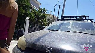 Kinky woman flashes pierced nipples and pussy on public street