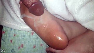 Intense Cumshot On Oiled Feet