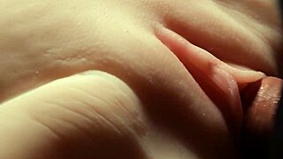 Touching the smooth wet pussy gently