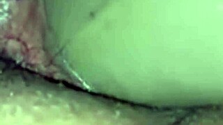 Why does this ebony babe moan while playing with her wet pussy using a big dildo?