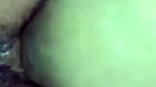 Why does this ebony babe moan while playing with her wet pussy using a big dildo?