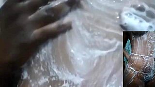 Cyndy Blackslave masturbates in shower with intense squirt.