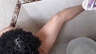 She takes a relaxing shower to unwind in her private room