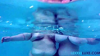 Busty BBW Lexxxi Luxe splashes wildly with friend in pool