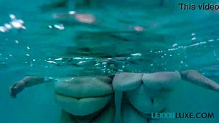 Busty BBW Lexxxi Luxe splashes wildly with friend in pool
