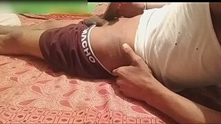 Desi Indian girl performs foot job on cocks using her feet in an outdoor group scenario