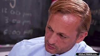 Student meets teacher in classroom