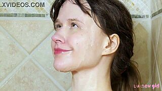 Charming blonde girl took a hot shower