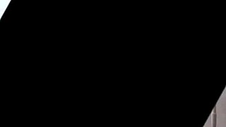 beautiful belly dancer performing with music and glasses on