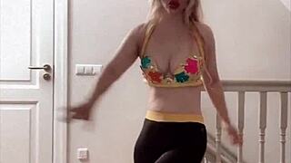 beautiful belly dancer performing with music and glasses on