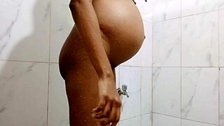 Pregnant woman enjoys bathing relaxation