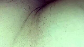 An amateur video captures the intimate exploration of her tight ass in a raw, passionate encounter.