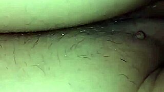 An amateur video captures the intimate exploration of her tight ass in a raw, passionate encounter.