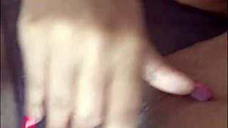 The ebony beauty fingered her pierced pussy relentlessly