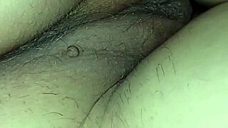 An amateur video captures the intimate exploration of her tight ass in a raw, passionate encounter.