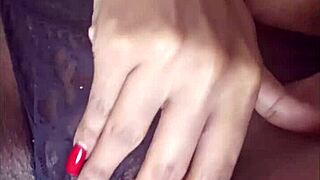 The ebony beauty fingered her pierced pussy relentlessly