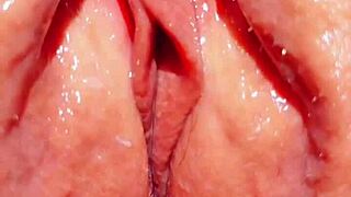 Feeling exposed, the mature woman spreads her big wet vulva outdoors