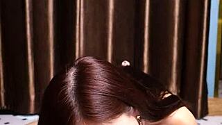 april maxima sucking a dildo before she gives it a footjob