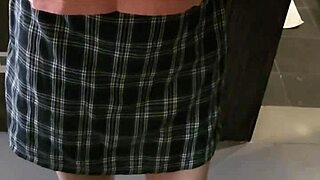 a shemale ladyboy teases herself in front of the mirror