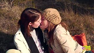 a couple of brunettes enjoy a hike with strapon activities and outdoor fun