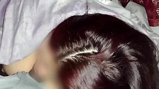 Watching movies with my neighbor while sucking his cock