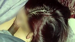 Watching movies with my neighbor while sucking his cock