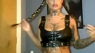 Scottish goth with big tits fingers her ass hard until she cums.