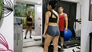 My trainer covers my mouth during rough gym sex