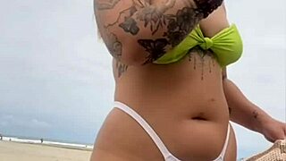 Beach exhibitionists flashing in front of husbands