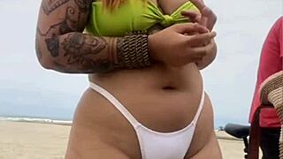 Beach exhibitionists flashing in front of husbands