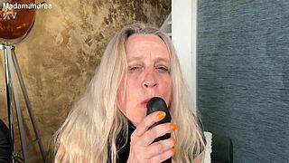 Blonde in latex corset performs horny prolapse fisting with mega dildo