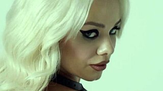 petite blonde teen elsa jean poses with sword showing curvy body